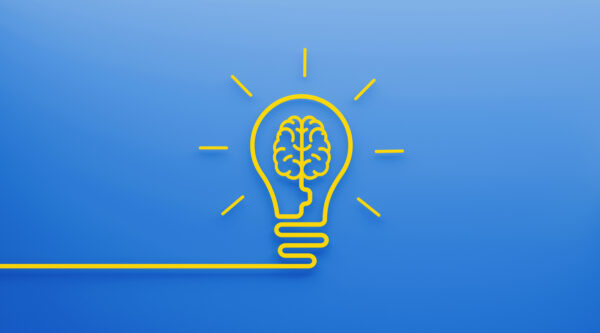 Brain Shape Inside A Light Bulb on Blue Background